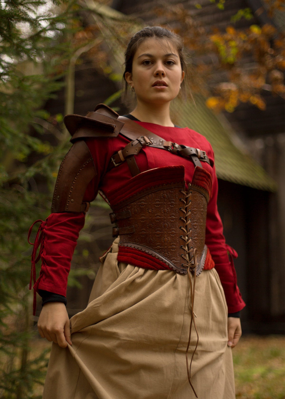 Épaulière en cuir marron avec harnais