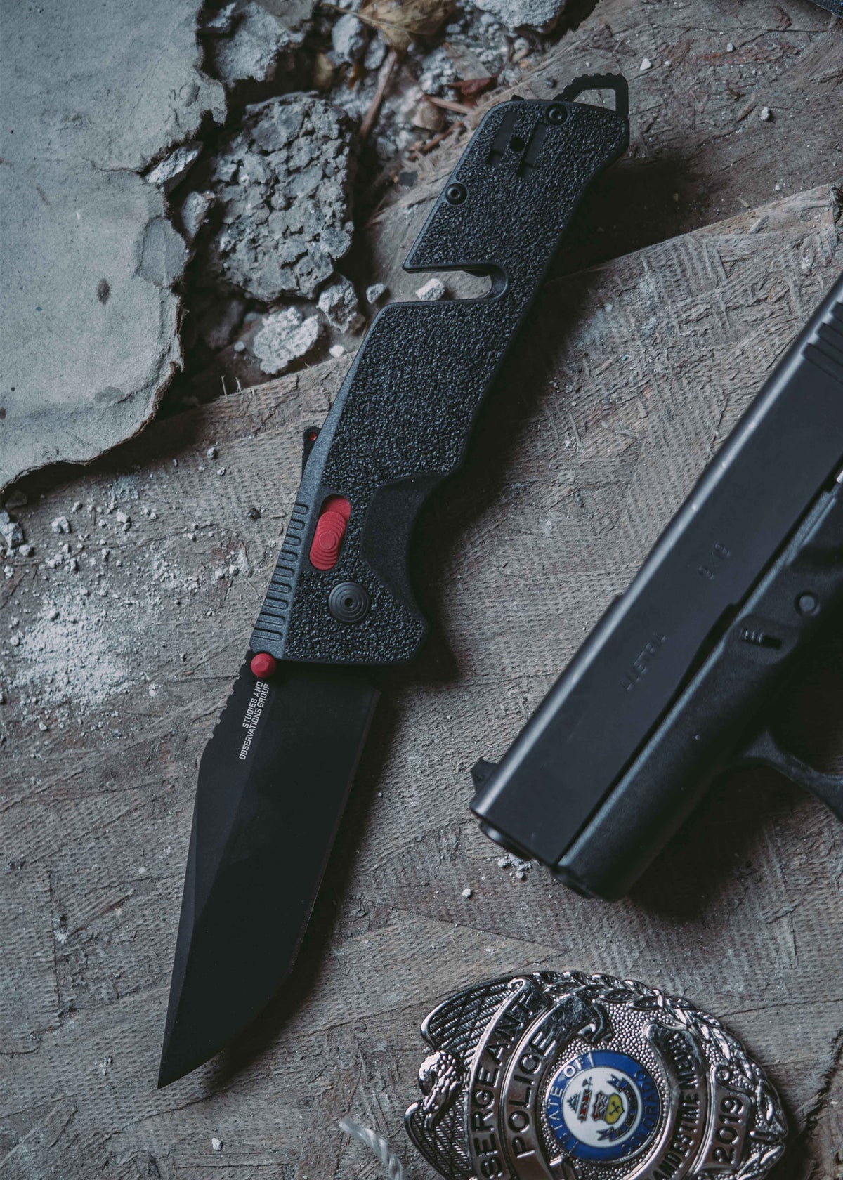 Couteau pliant SOG Trident AT noir et rouge lame tanto